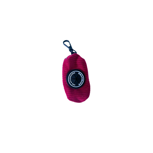 Distributeur magenta de sacs à déchets canins